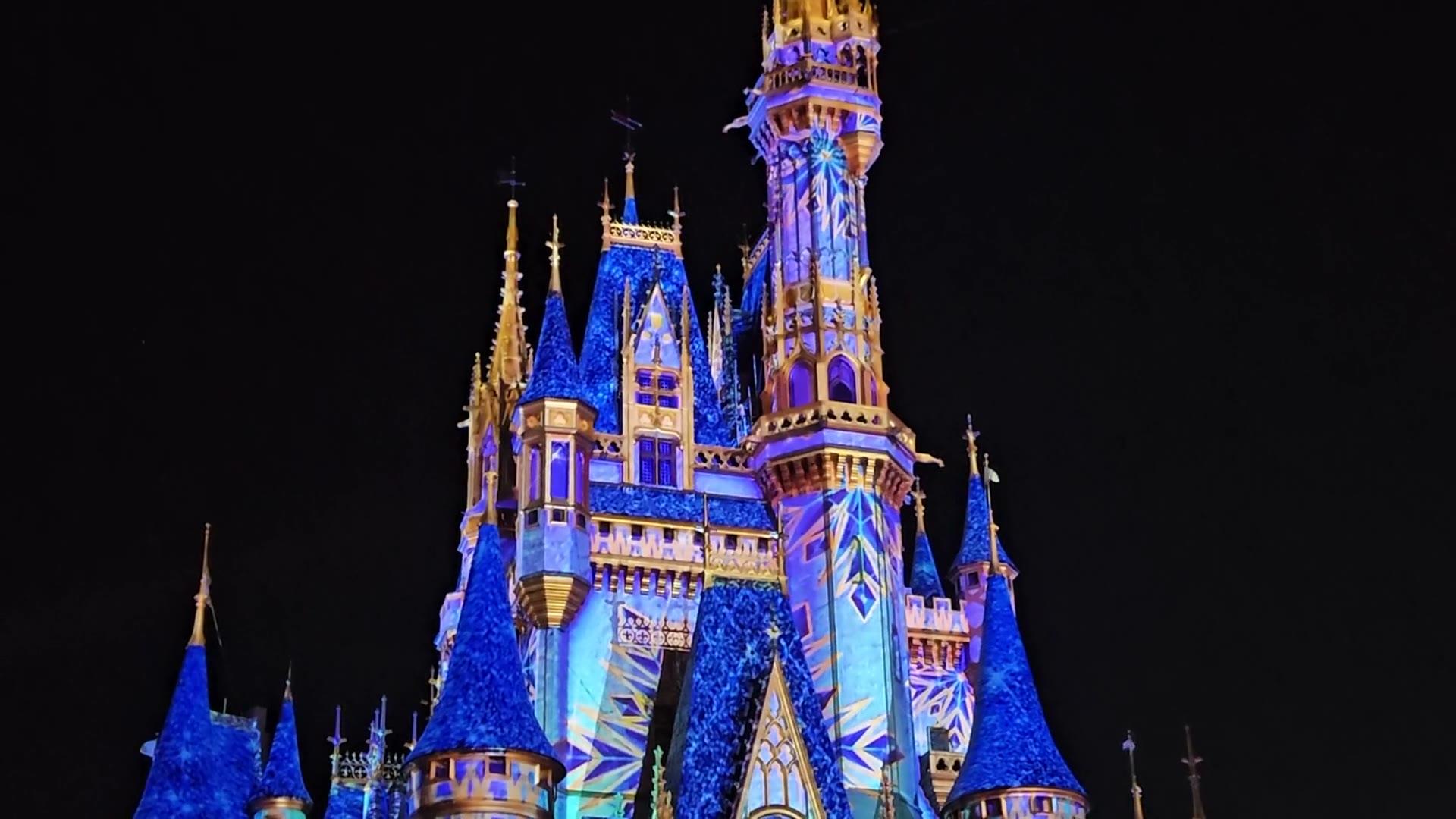 Cinderella Castle lit at night at Magic Kingdom