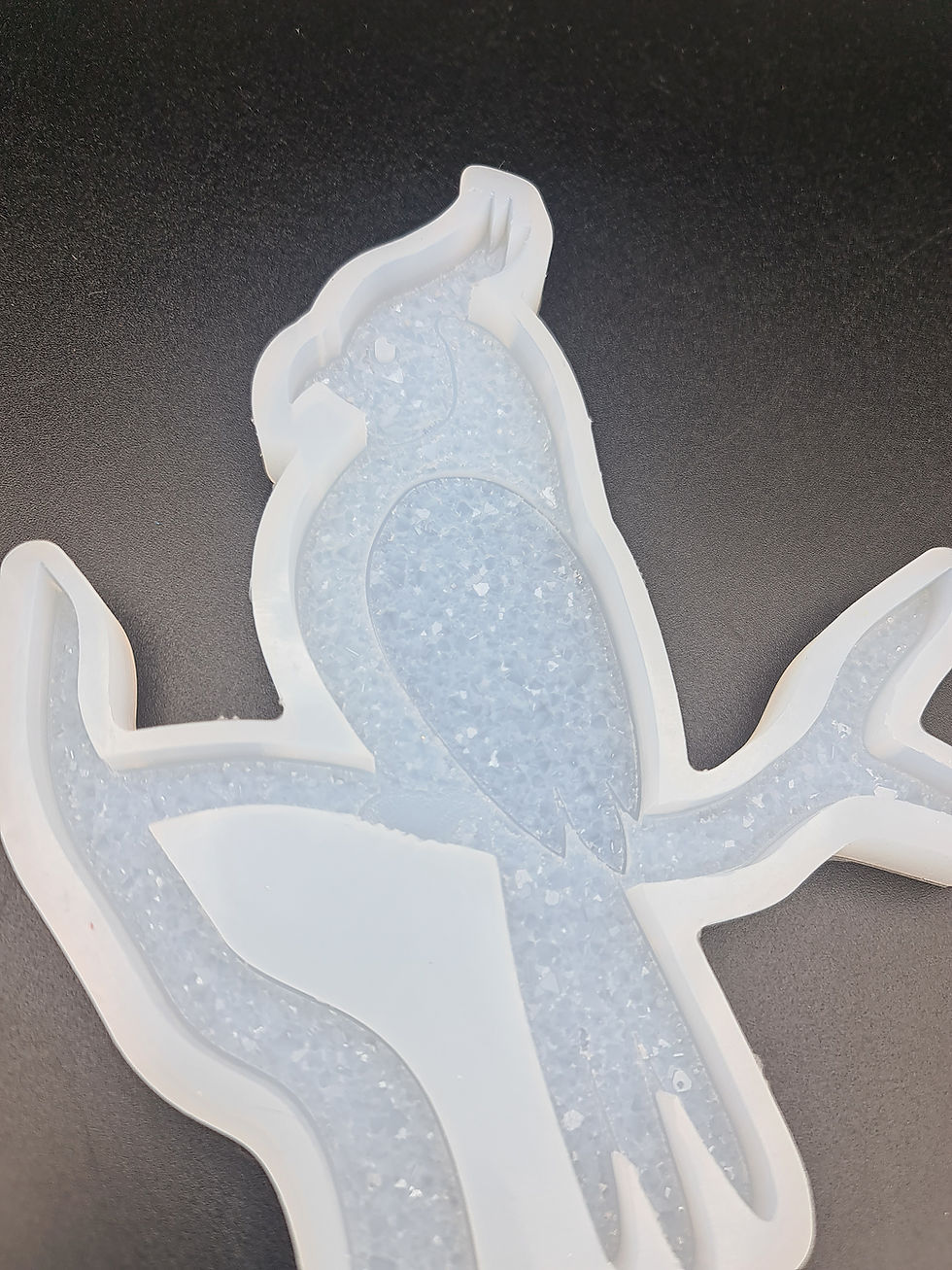 Thumbnail: Druzy parrot on branch with base mold