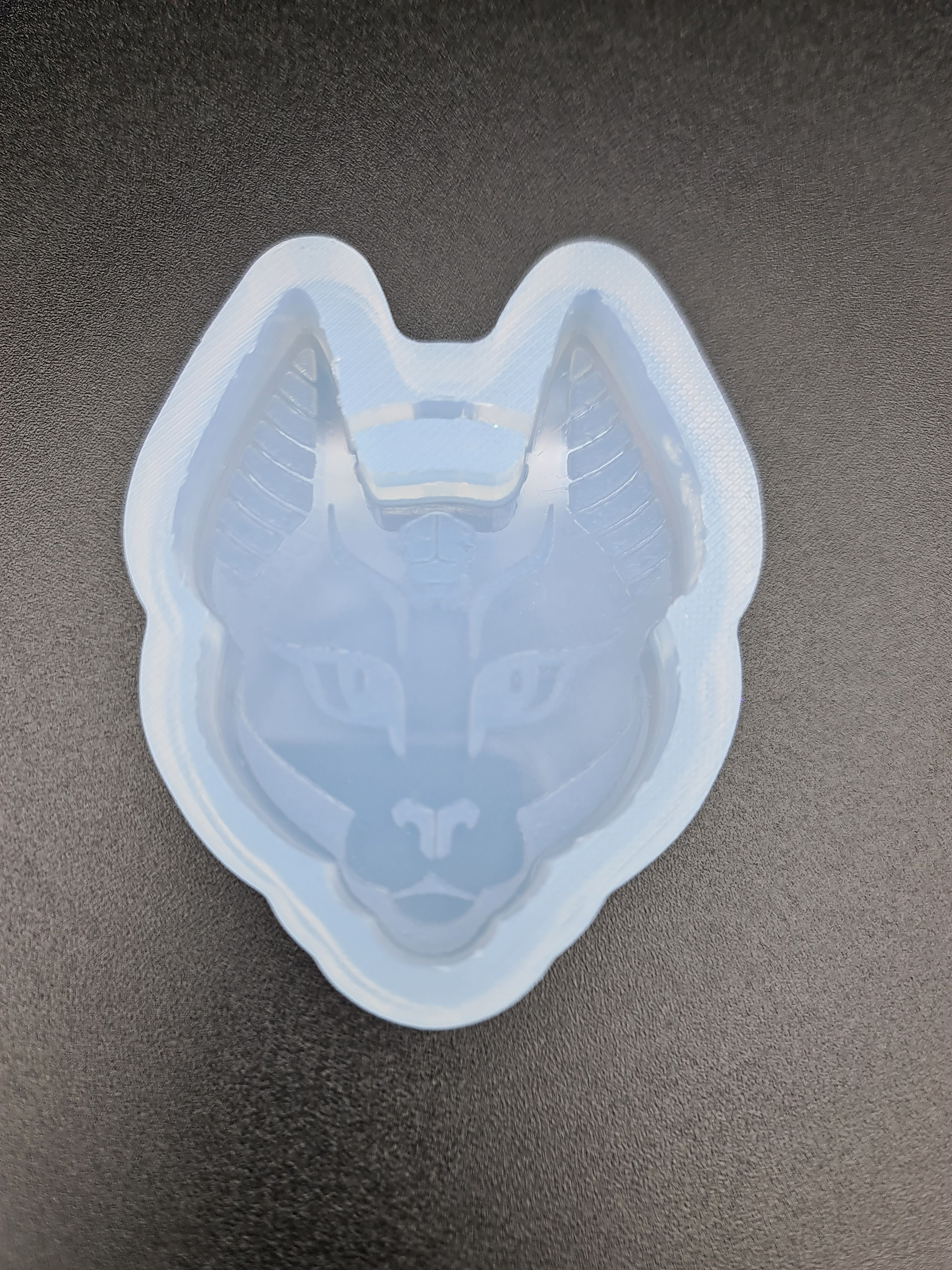 Sphinx head with scarabee