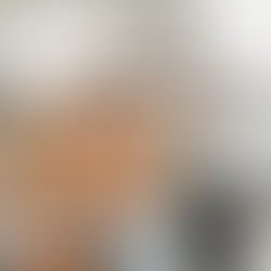 retired woman getting an eye exam with bright light in her left eye