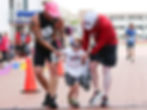 Boy with Cerebral Palsy crosses race finish line