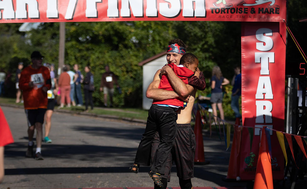 myTEAM TRIUMPH Father and Son Crossing the finish line