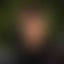 Boy with a disability smiling after participating with myTEAM TRIUMPH