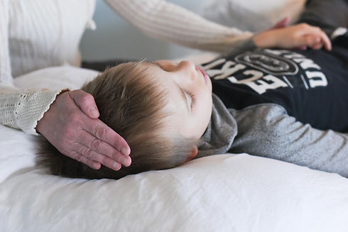 young boy during a BodyTalk session