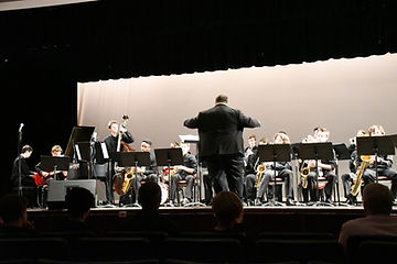musicians on stage performing