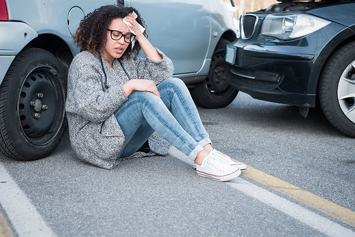 Injured woman feeling bad after having a car crash.jpg