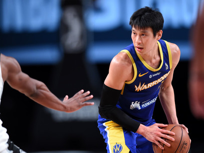 Why is there a lack of Asian representation in sports coaches?