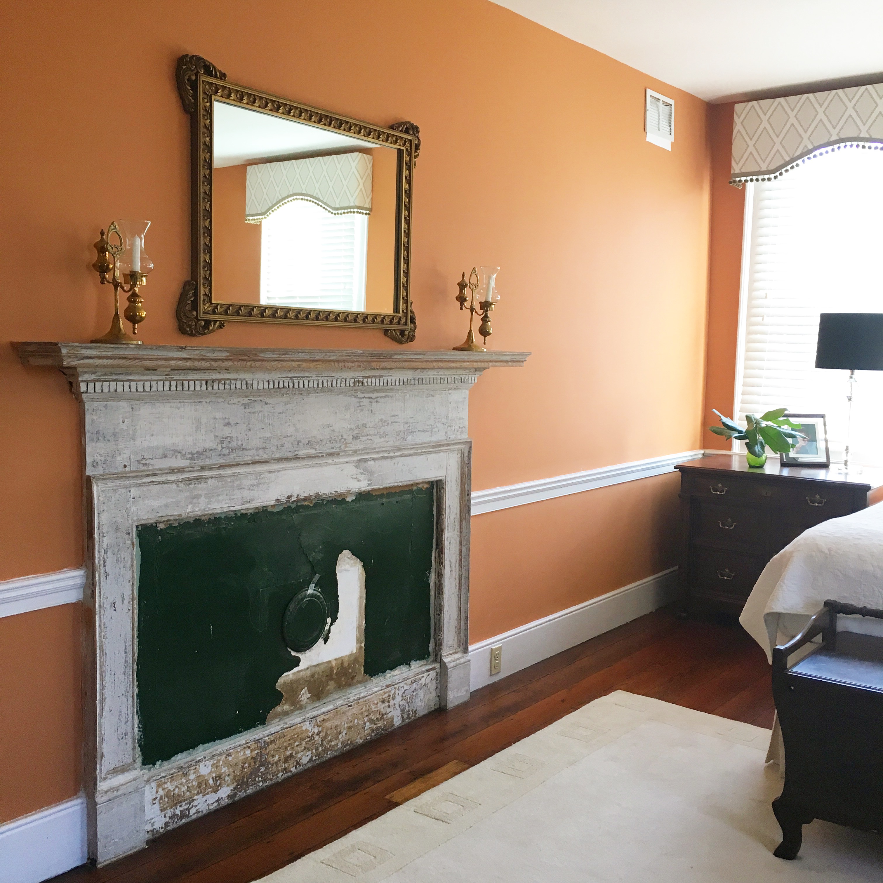 Historic renovation, original fireplace was left as a modern art piece