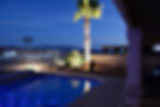 backyard and pool at night