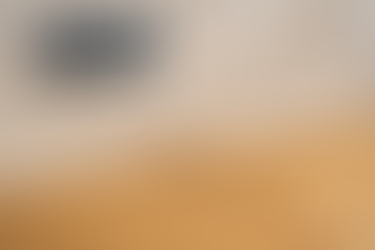 close up of Pharaoh and white footed ants trailing along a marble backsplash toward crumbs on a wooden countertop in a Hudson Florida kitchen, illustrating tiny ant control by Pest Away Exterminators