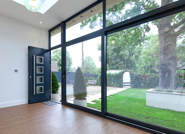 Full height glazing and contemporary front door