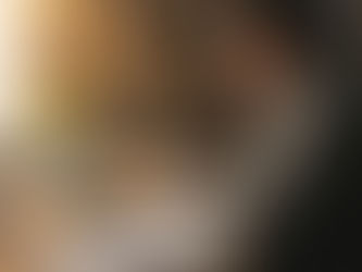 Cozy workspace with a person reviewing tax documents and a laptop, highlighting tax write-offs