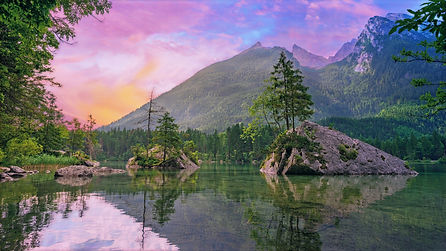 green trees near lake and mountain during sunset_edited.jpg