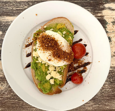 Breakfast of smashed avocado and poached egg on sourdourgh at our fitness retreat in Mandalong NSW