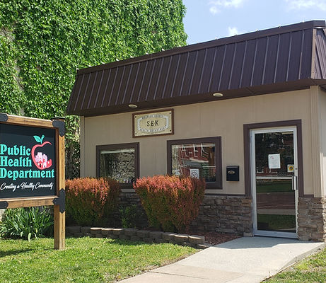 The Southeast Kansas Multi-County Health Department is shown. It is a small building with a brown roof.