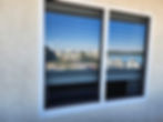 Double-pane window with two layers of glass and insulating gas for energy efficiency