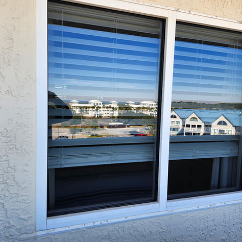 Double-pane window with two layers of glass and insulating gas for energy efficiency