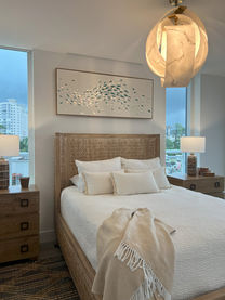 Capiz shell artwork above bed