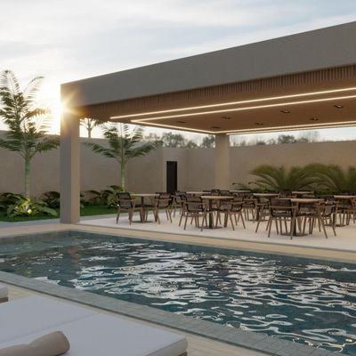 Área de lazer com piscina e espaço gourmet no condomínio Fort-de-France Residence, ideal para eventos ao ar livre.