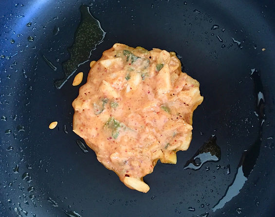 Kimchi batter in a frying pan