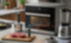 Kitchen with a modern oven, sous vide, and blender. A steak on a cutting board, water splashes, and a digital display showing 200°.