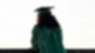 woman in university degree gown with back towards camera - what to do if you havent received your student loan yet