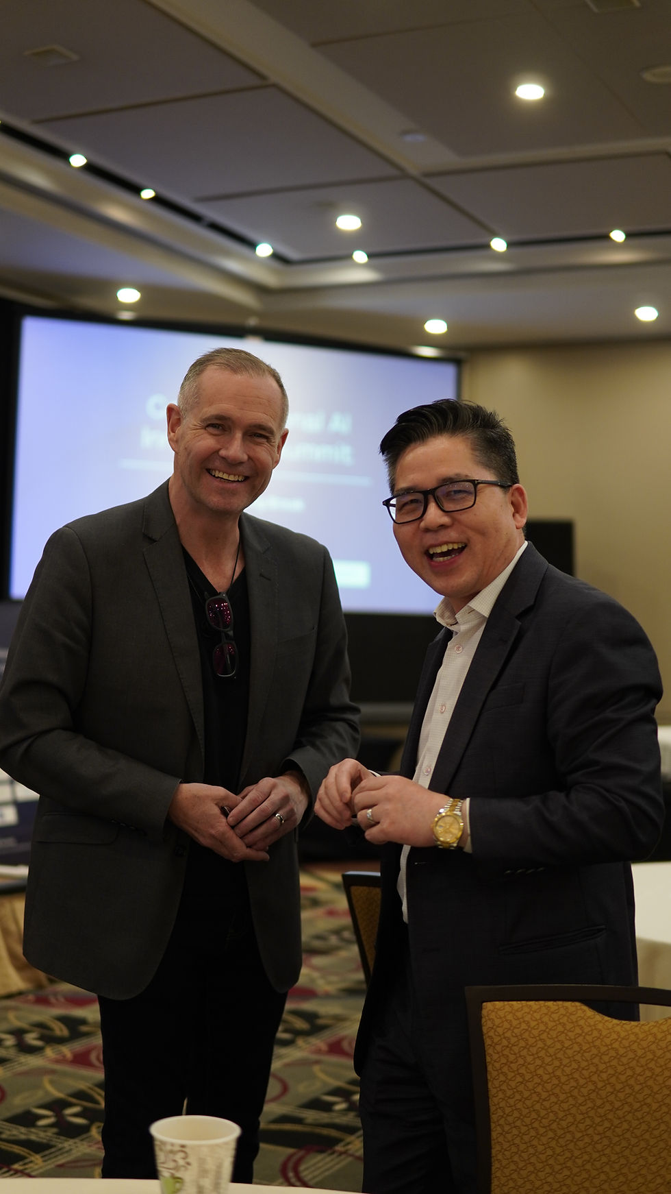 Two delegates networking at the ConfX BIAAS conference