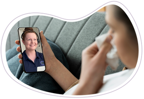 Image of a person blowing their nose while having a call with a friendly First2Care staff member