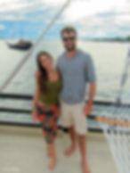 Girl with long brown hair with arm around celebrity Joshua Jackson. Pacey Dawsons creek Joshua Jackson aboard Dewi Nusantara Raja Ampat, Indonesia. Scuba Diving holiday. Boat Deck
