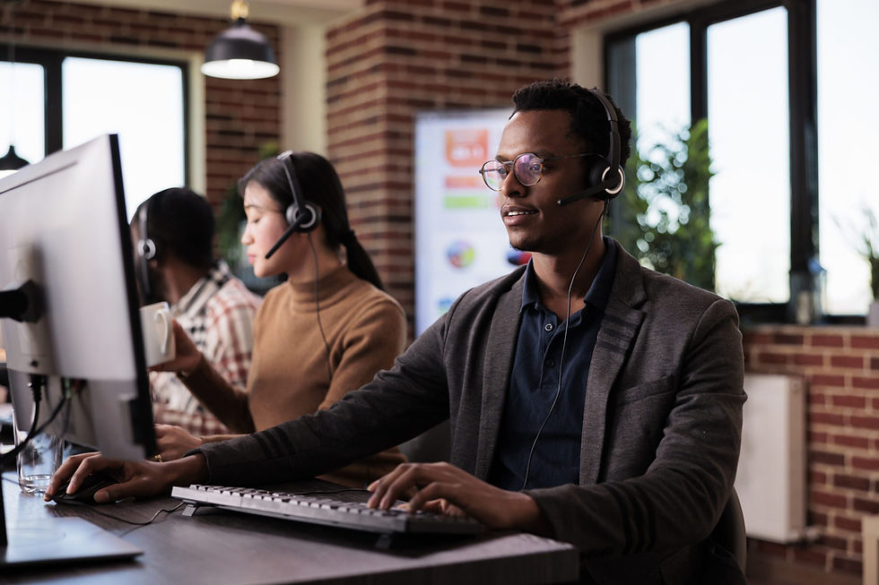 african-american-helpline-employee-working-call-center-reception-with-multiple-monitors-ma