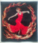 A pictorial art quilt of A Woman Dancing surrounded by flames
