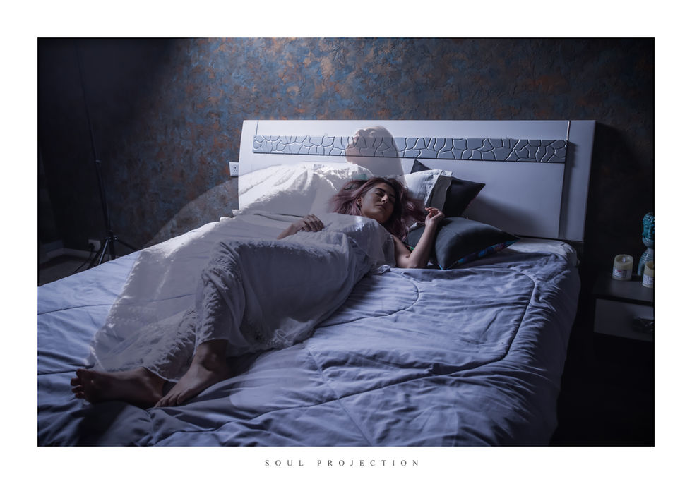 a beautiful girl sleeping on bed