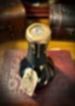Thumbnail: Handmade dark potion bottle, golden brass seal, mystical decoration art.