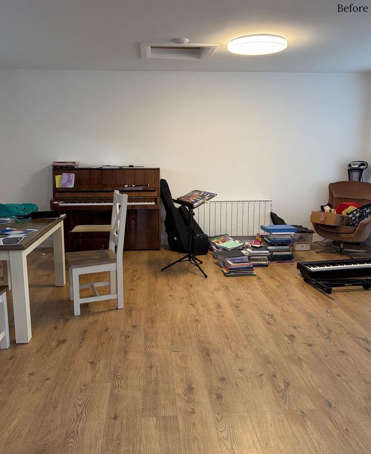 Rural Ireland garage conversion with a piano, study area, parent seating and bespoke interior design