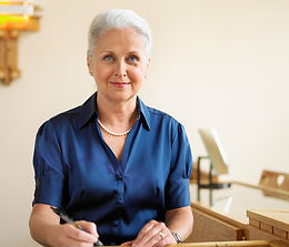 Smiling Woman Writing
