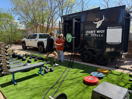 Fort Woi Fitness mobile gym setup with two people