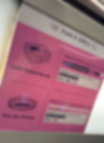 Pink sign on the Paris metro trains showing sports venues