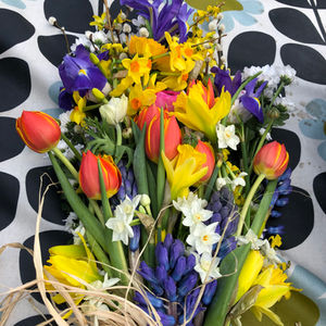 a bunch of flowers are laying on a table