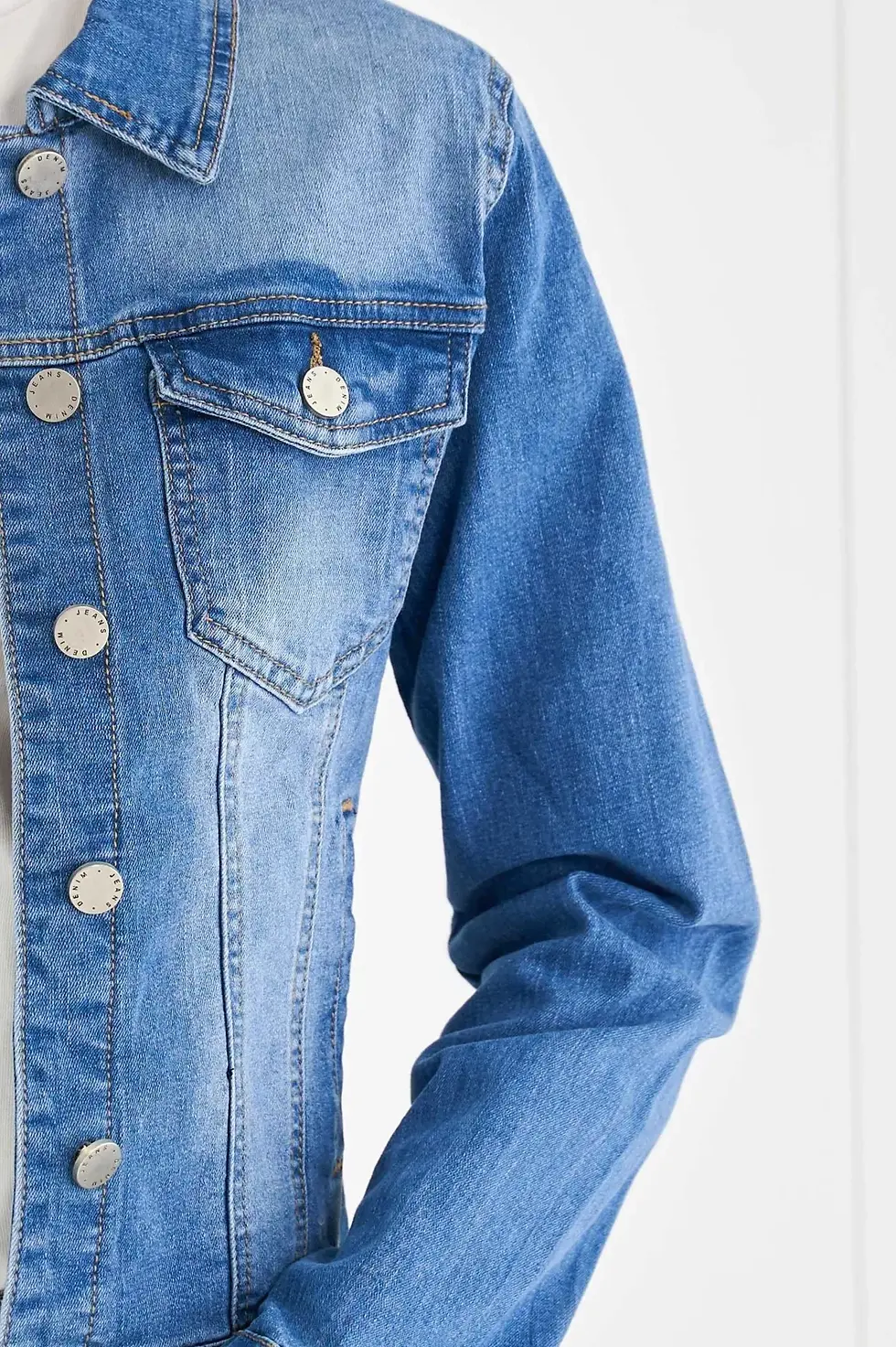 Thumbnail: Woman wearing denim jacket 