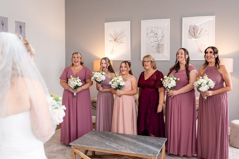 Bride and bridesmaids first look in Pelham House