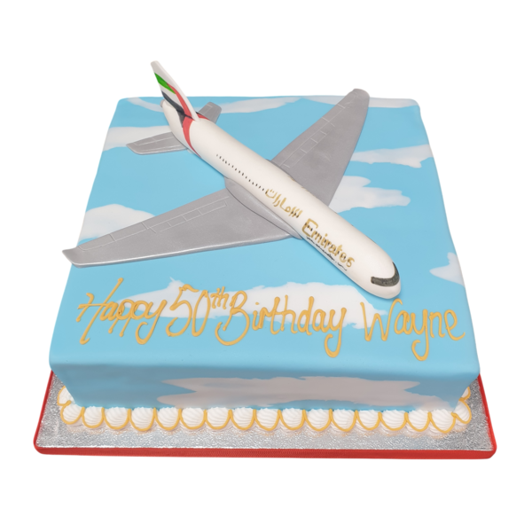 Bespoke single-tier celebration cake with elegant white icing and delicate floral decorations in Solihull, West Midlands.