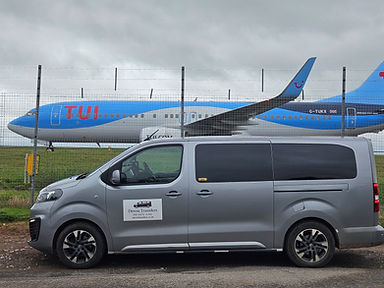 Devon Transfers at Bristol Airport with TUI in the background