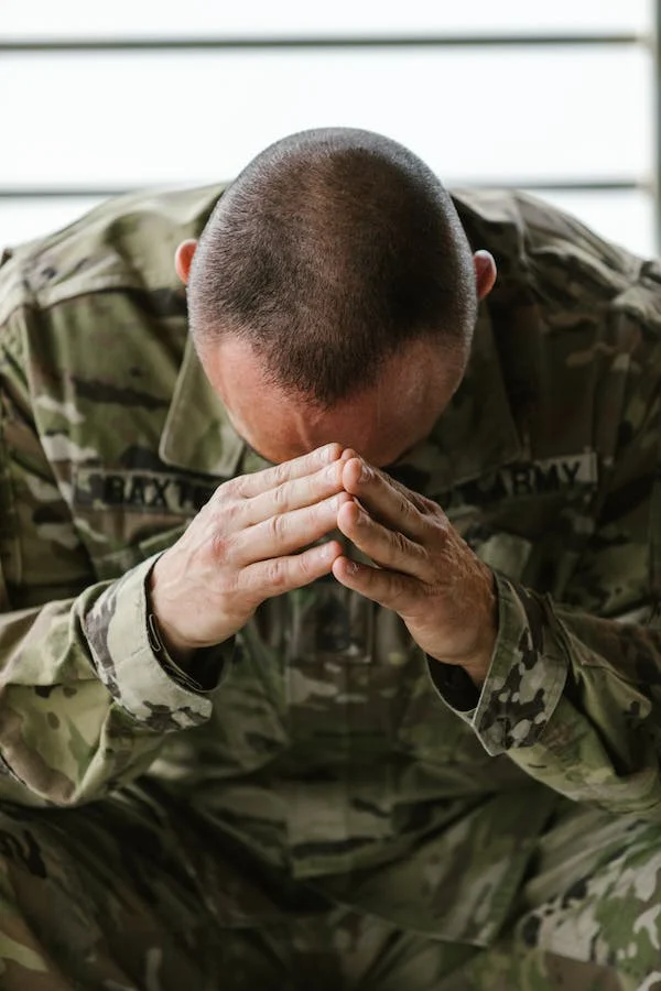 A military man showing signs of PTSD