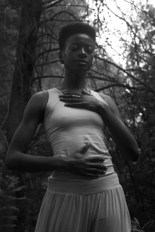 Woman demonstrating Diaphragmatic Breathing