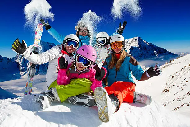 A family enjoying a skiing holiday