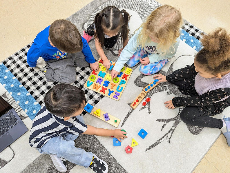 All kids on the circle mat.jpg
