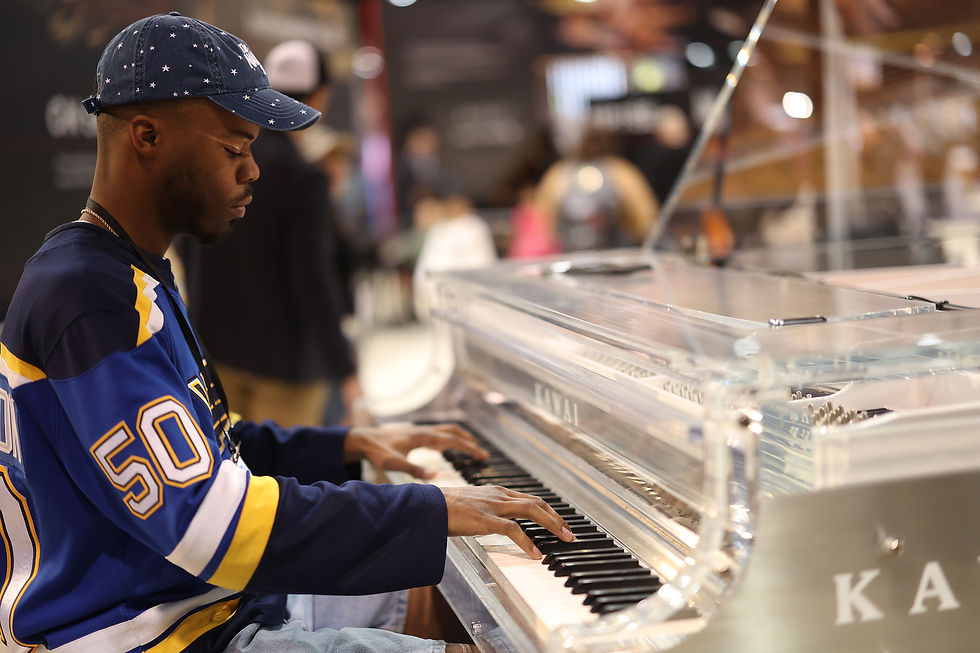 Kawai Crystal Grand acrylic transparent piano on display at NAMM 2026.