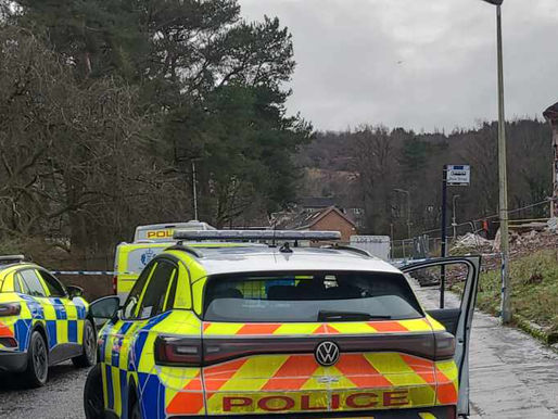 Police at the scene yesterday.