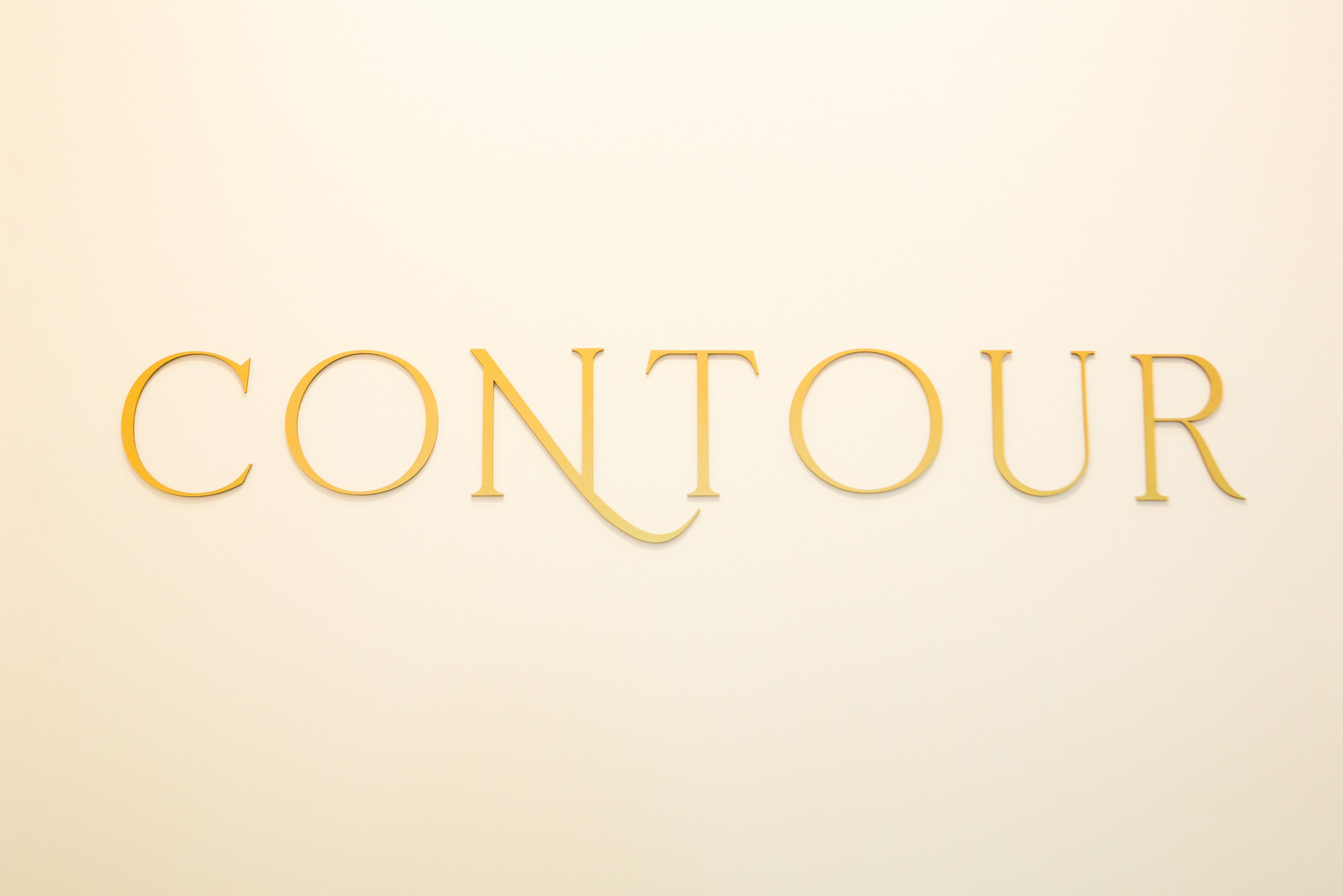 Clean, professional medical spa treatment room with neutral tones at Contour Medical Aesthetics in White Plains