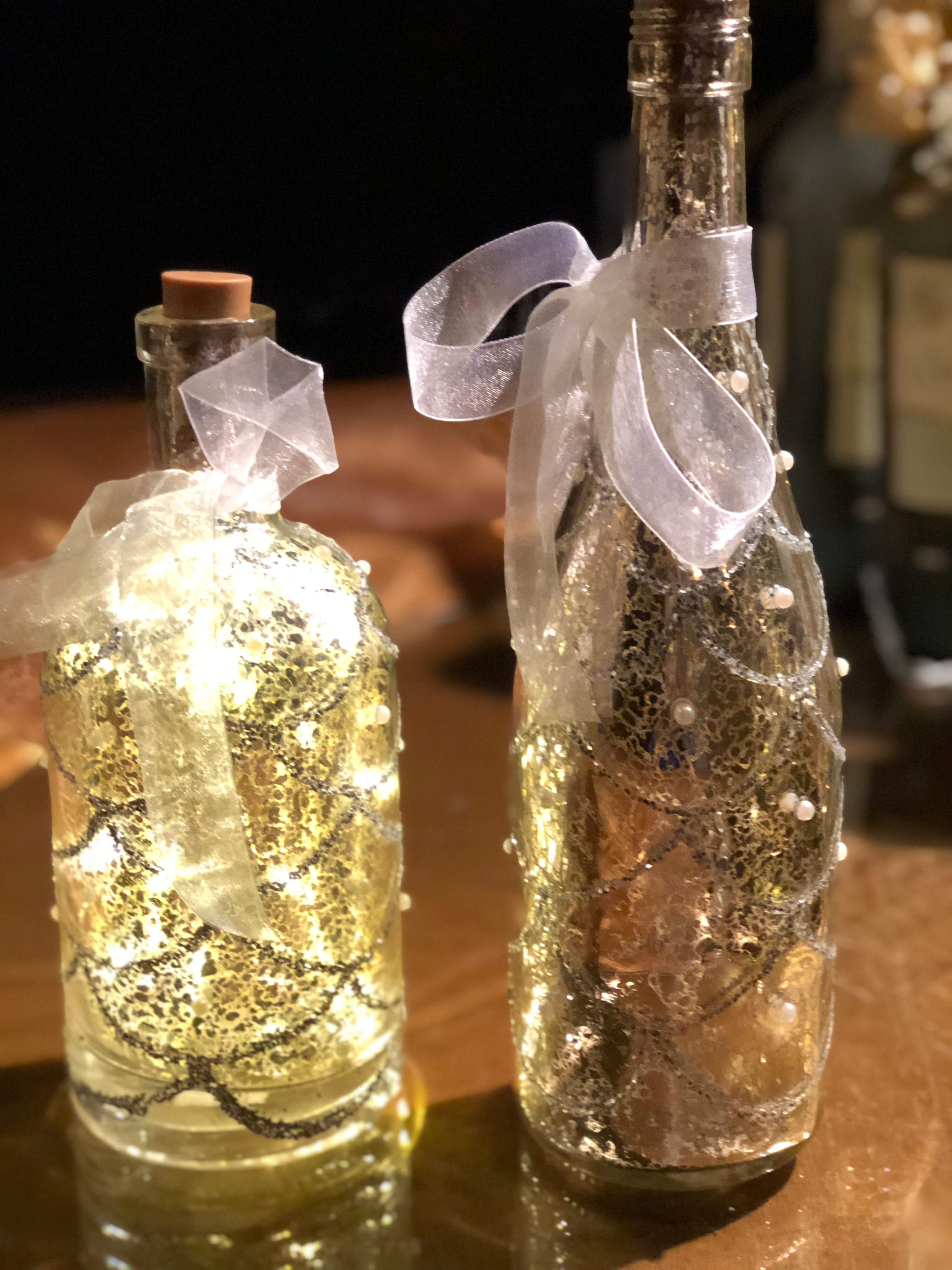 Silver and pearl lighted bottle